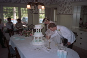 Cutting the wedding cake.