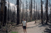 Bill on the Rainbow Falls trail through the burned forest.