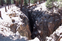 A big crack in the ground.  View is to the south.