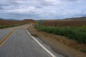 Ron descends into Fresno County through hills of red and green grass. (1250ft)