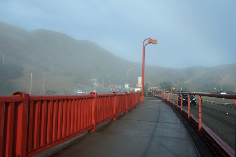 Fog rising over the Marin Headlands on a very wet Golden Gate Bridge.