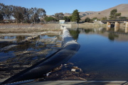 Inflatable dam on Alameda Creek near Mission Blvd. creates a small reservoir along the creek.