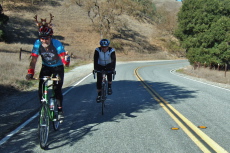 These cyclists enjoy the gradual descent through Bear Valley.