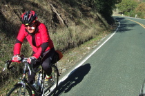 A rider climbs CA25 from Willow Creek to Bear Valley (1)