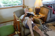 David reads a Stephen King novel in his favorite chair.