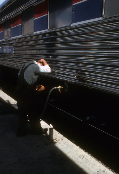 Refilling the car's water tank (that had a bad leak and always ran out between fill-ups).