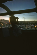 A little girl looks through binoculars while the train is stopped in Reno, NV.