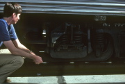 Bill examines the carriage's suspension.