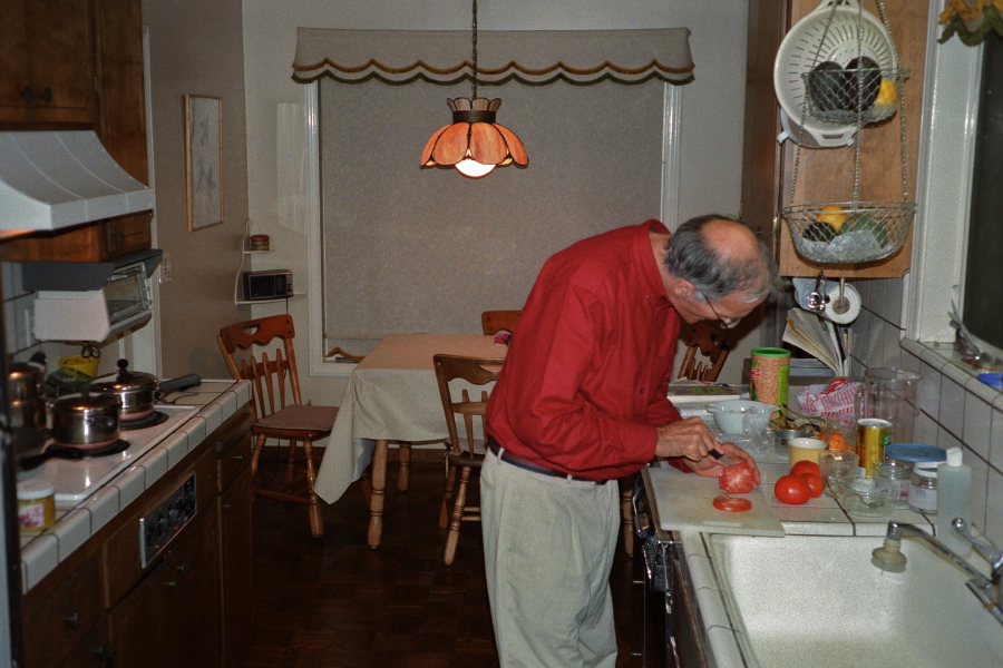 David prepares dinner.