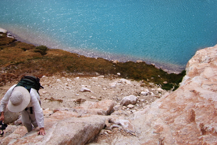 David climbing the boulder on the north side of the lowest Conness Lakes.