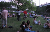 Crowd gathering to watch the departure of the bats from the Congress Ave. bridge