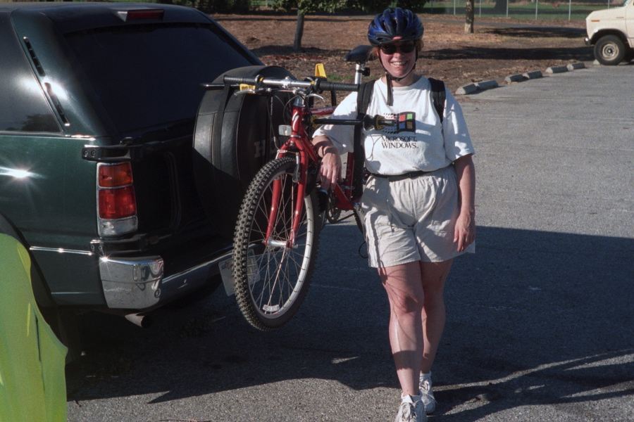 Barbara and her bike on the back of her SUV