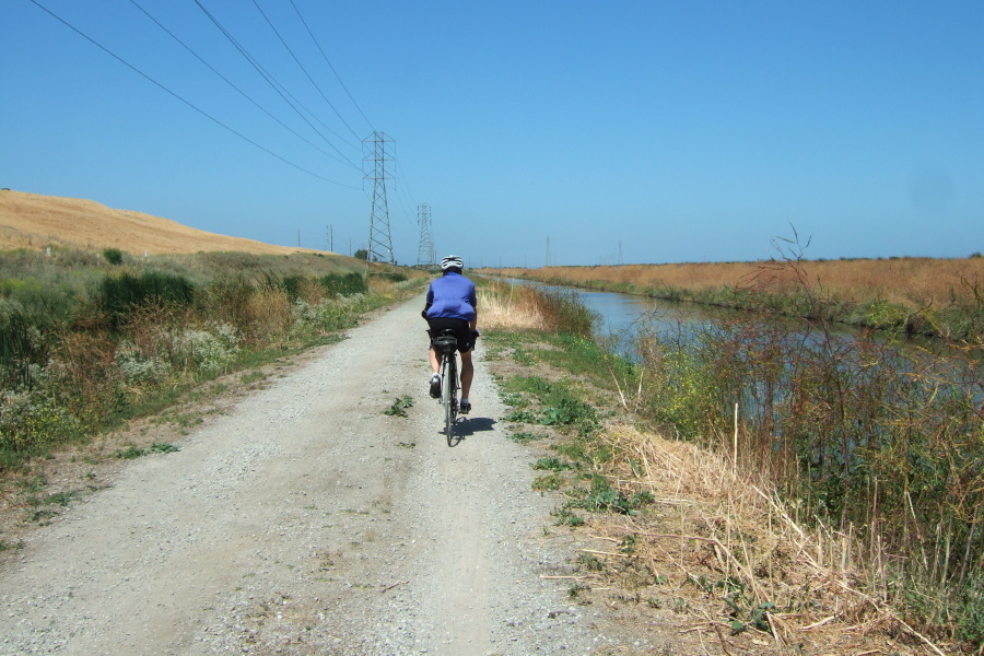 Frank leads the way on the trail behind Lockheed.