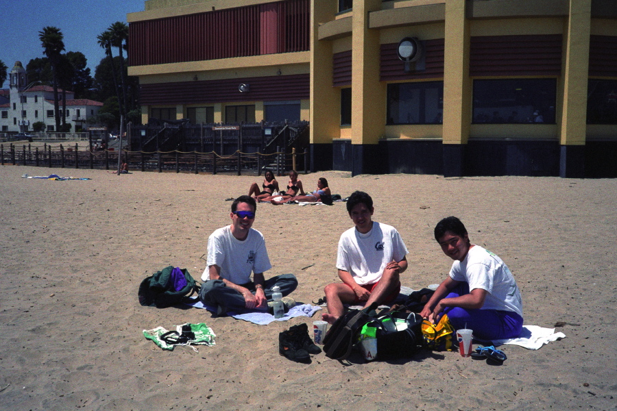 Bill, Anthony, and Nahoya on the beach in front of the Coconut Grove...