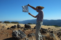 David demonstrates the wind blowing atop Black Mountain.