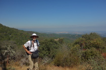 Frank enjoys the view north from the bench at the top of the PG&E Trail.