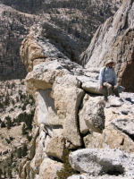 David sitting on the precipice on Echo Ridge (11100ft)