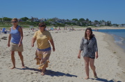 Laura, Linda, and Ryanne walk down the beach.