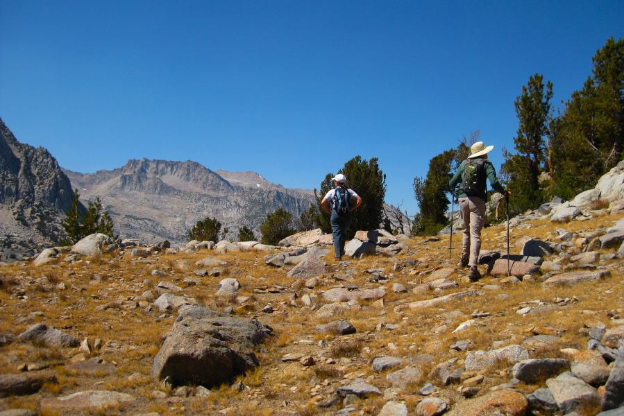 Stella and Bill look for the easiest way up Chocolate Peak.