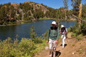 Bill and David hike along Long Lake.