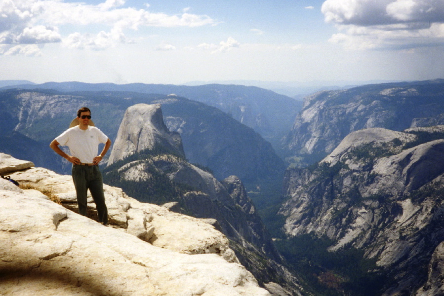 Bill near the edge; view is toward Yosemite Valley