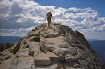 David climbs the razorback ridge to the summit of Clouds Rest.