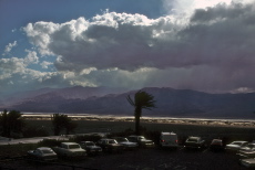 Clouds over Death Valley and Furnace Creek Inn parking lot