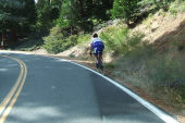 A lone cyclist climbing the west side.