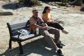 Frank and Stella enjoy the bench at Donnell Overlook.