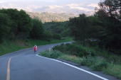 Ron rides down Marciel Rd. to the campground at Lake Chabot Park.