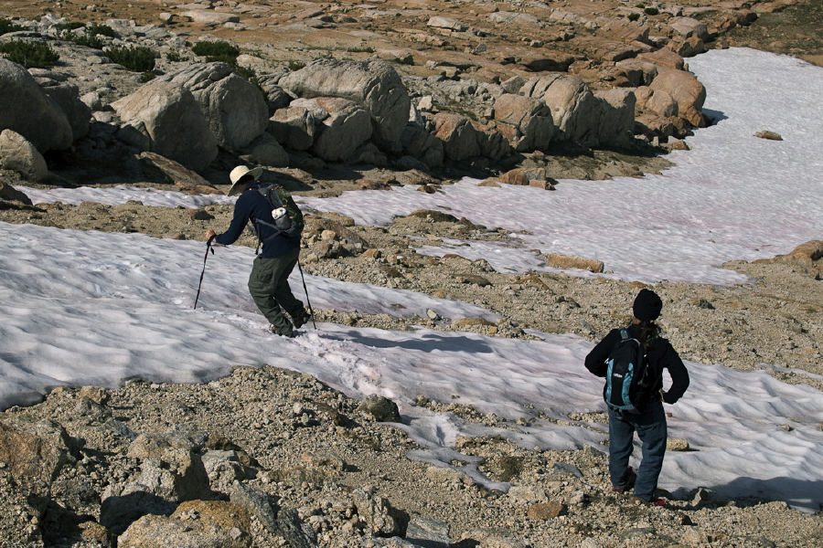 Bill ventures carefully across the snow without spikes on his shoes.