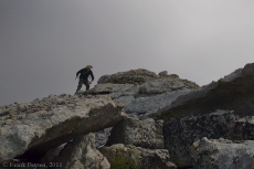 Bill carefully descends the narrow ridge.