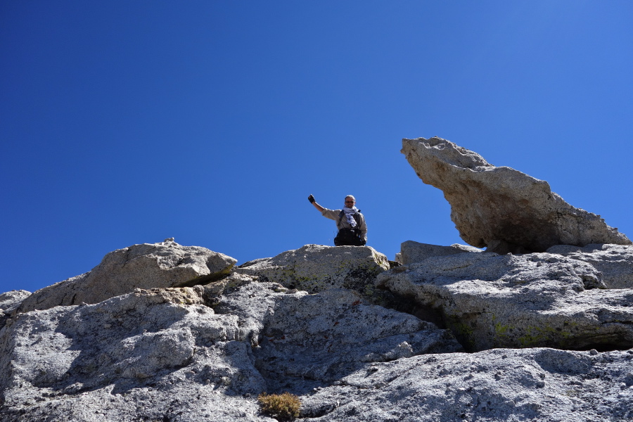 Frank attains the summit.