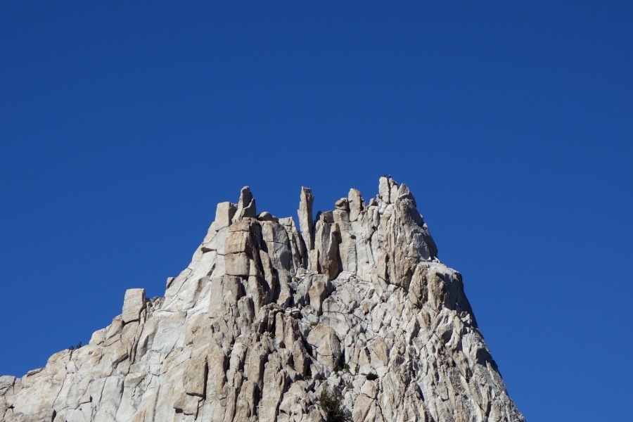 Climbers peer down at us from the summit.