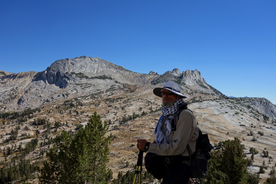 Frank prepares to climb the trail to the summit ridge of Cathedral Peak.