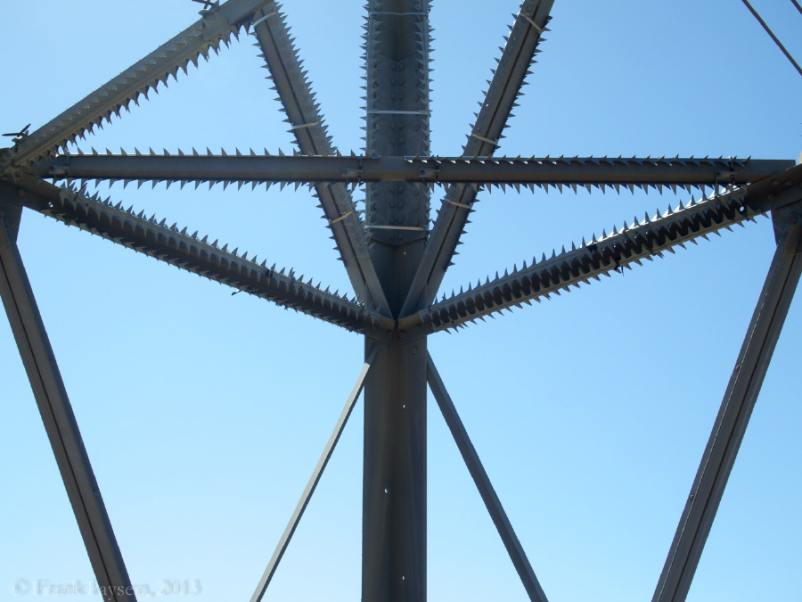 Spikes keep the curious from climbing the tower.