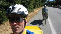 Riding up Old San Jose Rd. with Ron Bobb. (100ft)