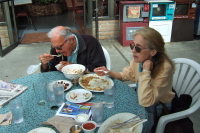 David and Kay finish their meals at Dharma's.