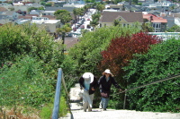 David and Kay climb the east stairs from Capitola.