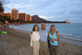 Kay, David, and Laura on Waikiki Beach at sunset.