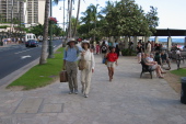 Mom and Dad walk to hotel room along Waikiki Beach.