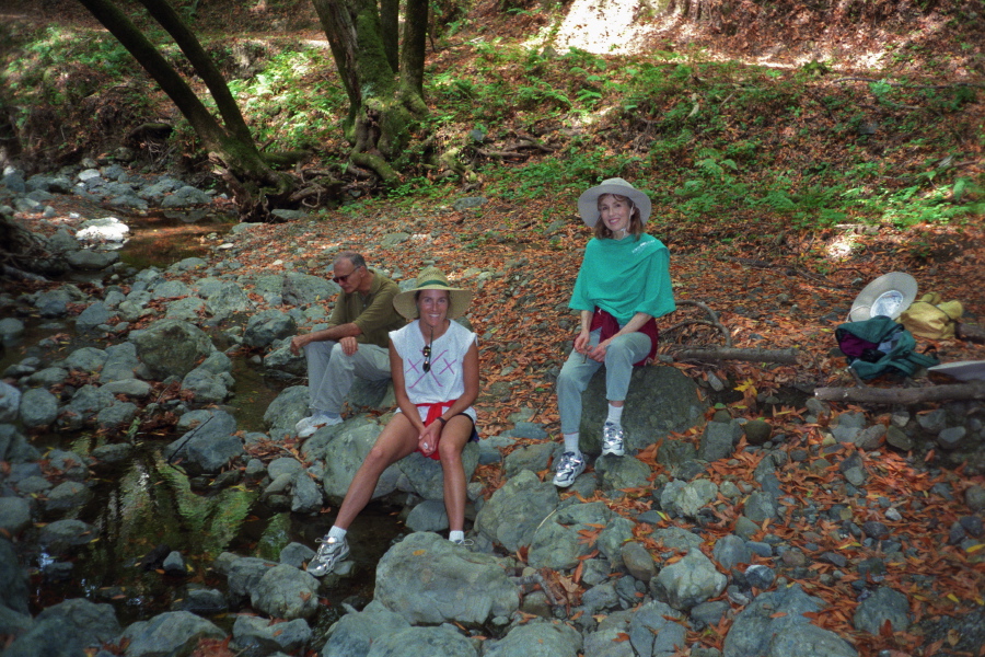 David, Laura, and Kay rest alongside Los Trancos Creek.