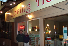 Len and Lisa in front of Loving Hut
