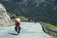 Other cycle tourists on the road descend ID75 back toward Ketchum, ID.