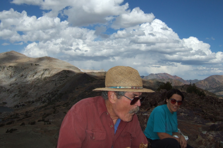 Ron eats a Clif Bar, and Stella wonders if we'll get wet while the clouds gather over Gaylor Peak (11004ft).