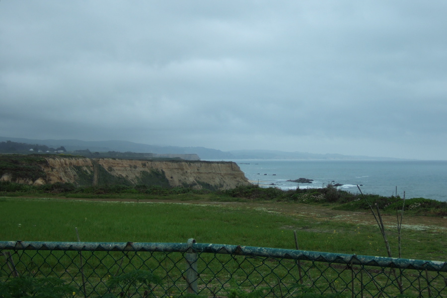 The coastal bluffs march south past the end of the trail.