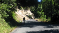 Laura descends past sandstone cliffs on Bean Creek Rd., Scotts Valley (500ft)