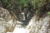 David climbs the dusty trench on the Ridge Trail.