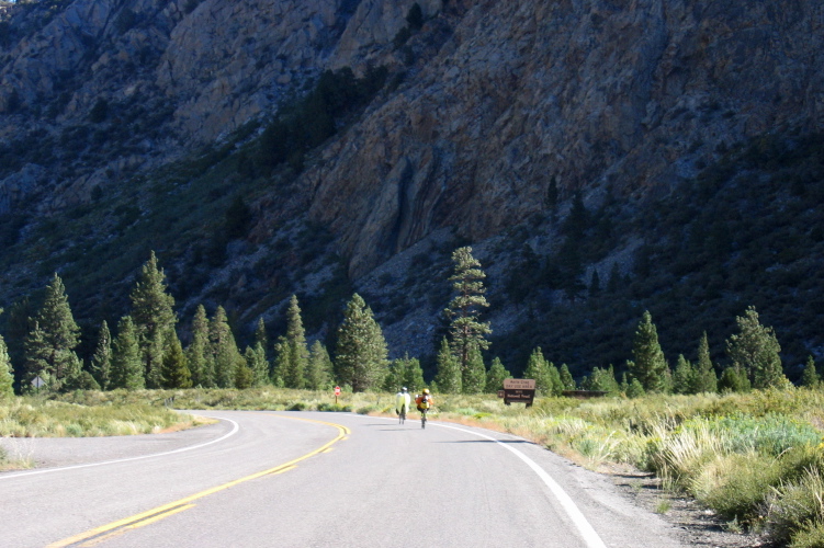 Ron Bobb (front) and Zach Kaplan pass by the foot of Reversed Peak (9481ft)