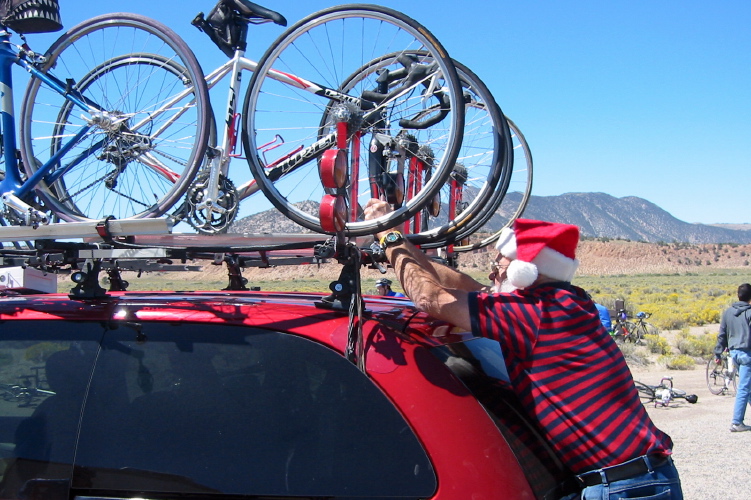 Lee gets the bike securely fastened to the rack.